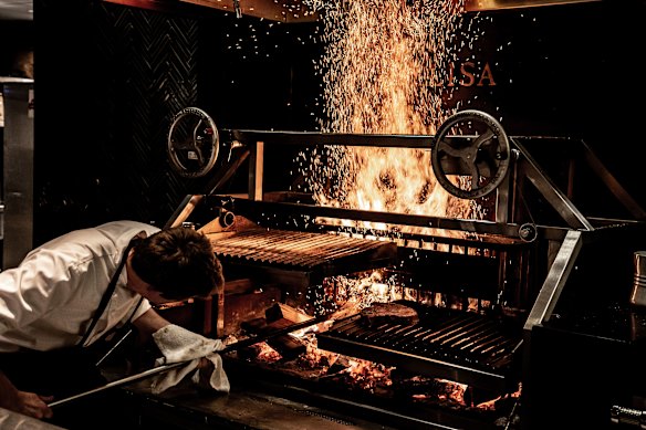 Steak on the grill at Elisa in Vancouver.