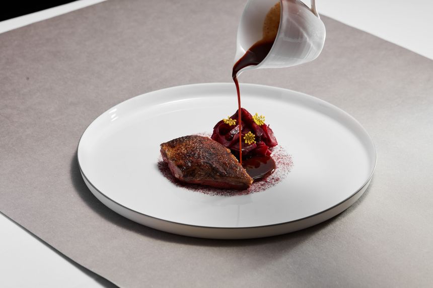 Pigeon from Brittany with foie gras, cherry, beetroot, parsley emulsion and Vadouvan sauce is on the menu at Caprice in Hong Kong.