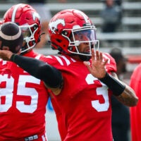 Jun 7, 2025; Calgary, Alberta, Canada; Calgary Stampeders quarterback Vernon Adams Jr (3) throws the ball during warmup against the Hamilton Tiger-Cats at McMahon Stadium.