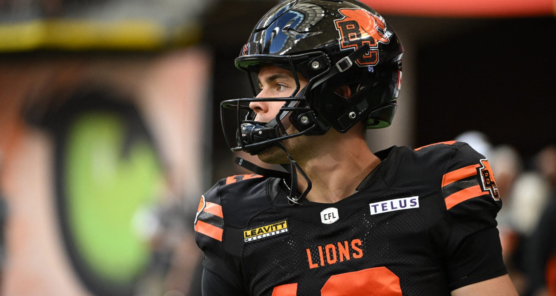 Jun 7, 2025; Vancouver, British Columbia, Canada; BC Lions quarterback Nathan Rourke (12) warms up prior to the game against the Edmonton Elks at BC Place Stadium.