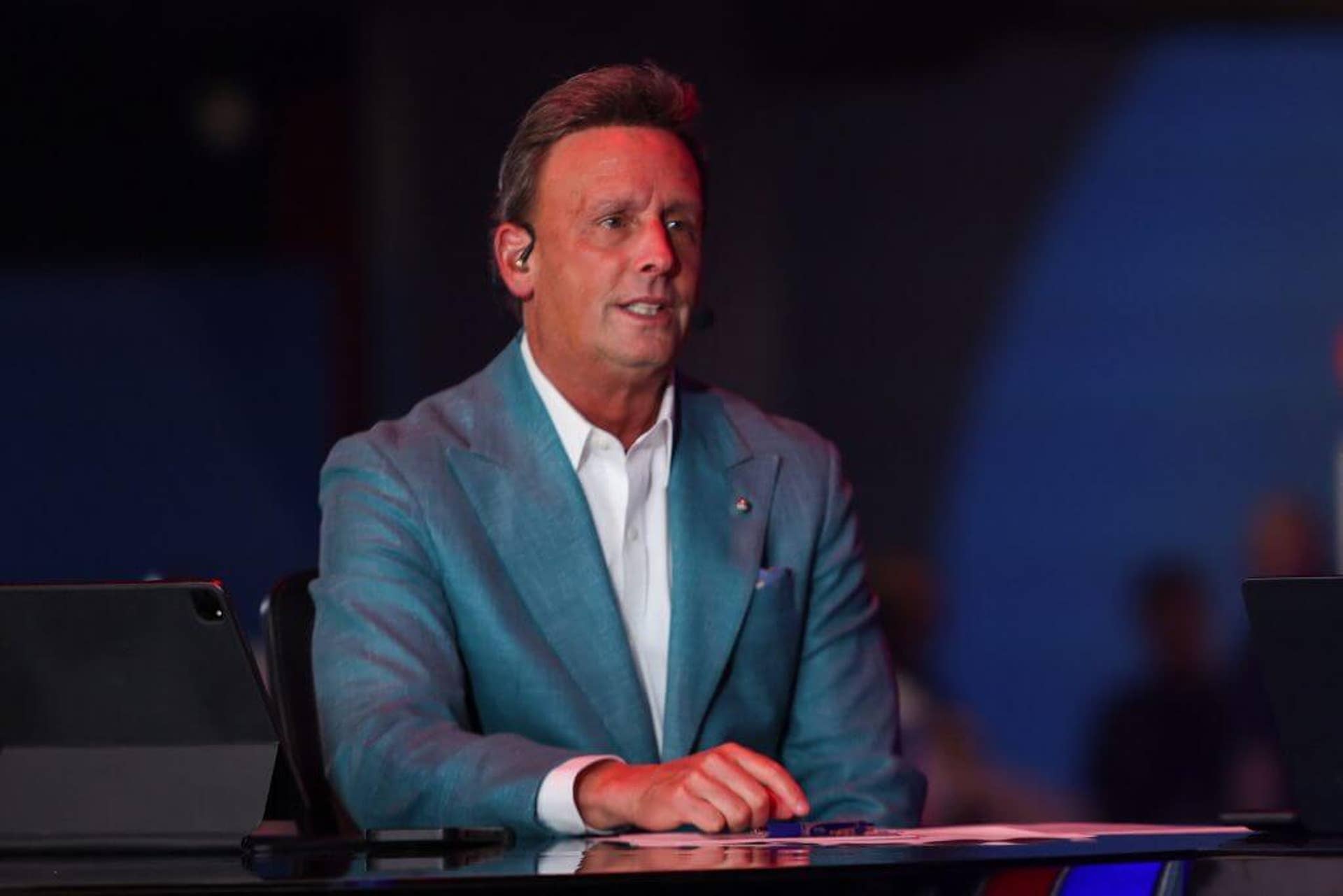 ESPN commentator Karl Ravech sits before the MLB Draft at The Coca-Cola Roxy in 2025.