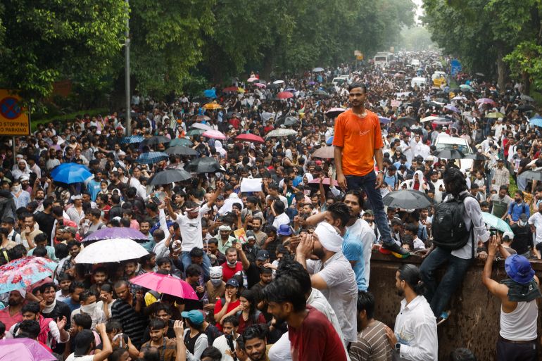 Supporters of the Cockroach Janta Party march towards parliament in New Delhi demanding the resignation of Education Minister Dharmendra Pradhan over exam paper leaks, 20 July, 2026