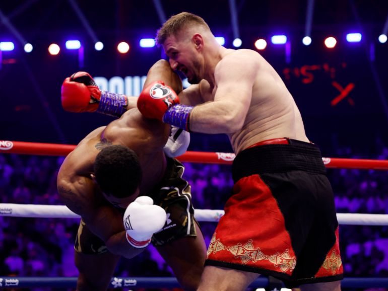 Boxing - The Comeback - Anthony Joshua v Kristian Prenga - Jeddah Superdome, Jeddah, Saudi Arabia - July 26, 2026 Kristian Prenga in action with Anthony Joshua during their heavyweight fight REUTERS/Ibraheem Abu Mustafa