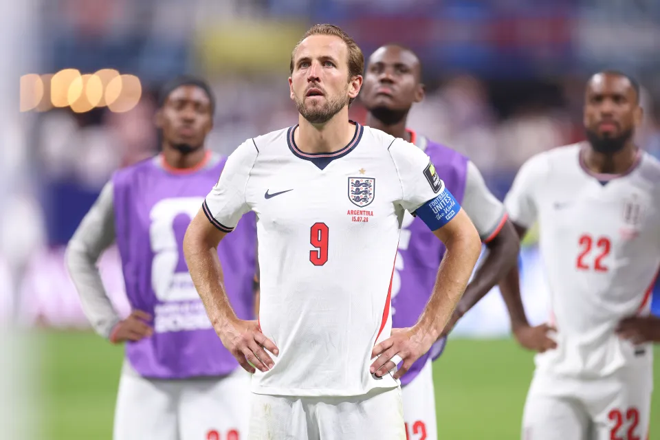 Harry Kane reacts after England's defeat to Argentina
