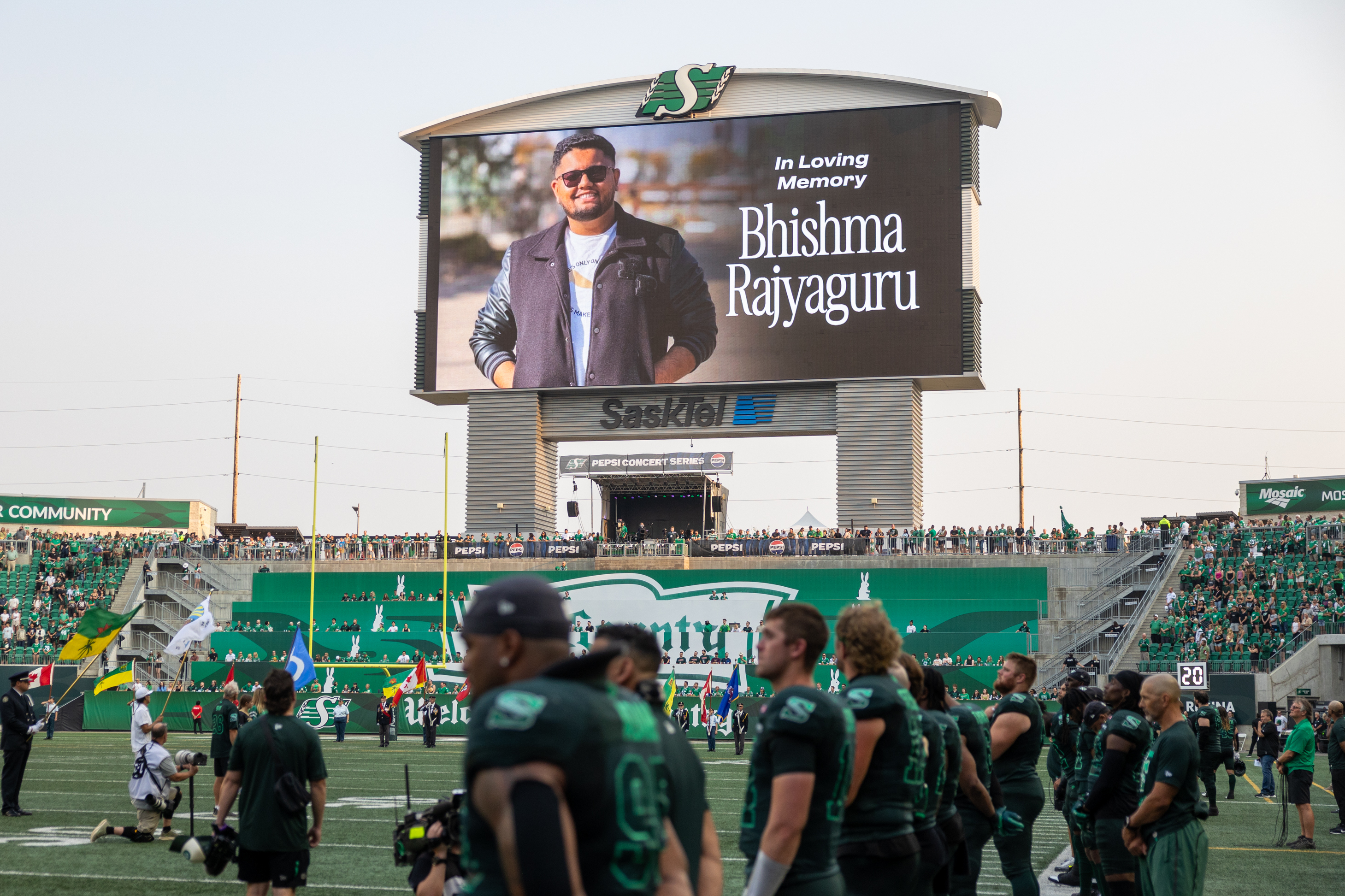 A video paying tribute to Bhishma Rajyaguru is played before CFL football action at Mosaic Stadium in Regina, on Thursday, July 23, 2026. Bhishma Rajyaguru died in a collision on Highway 11 on Sunday. (Regina Leader-Post/Heywood Yu)