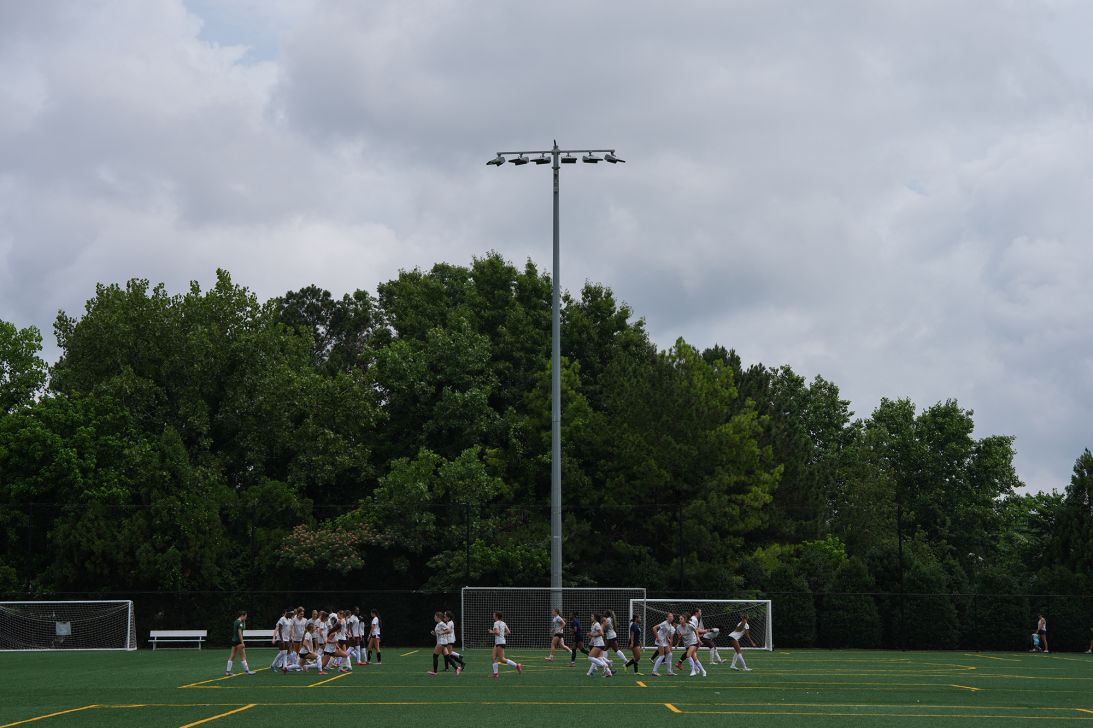 Players warm up ahead of tryouts at Riverline Park in Mableton, Georgia, on May 27, 2026. 