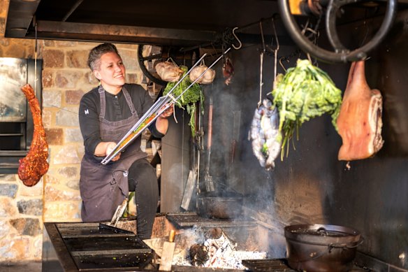 Chef Nicola Palmer of Watervale Hotel prepping produce for the pub’s wood-fired oven.