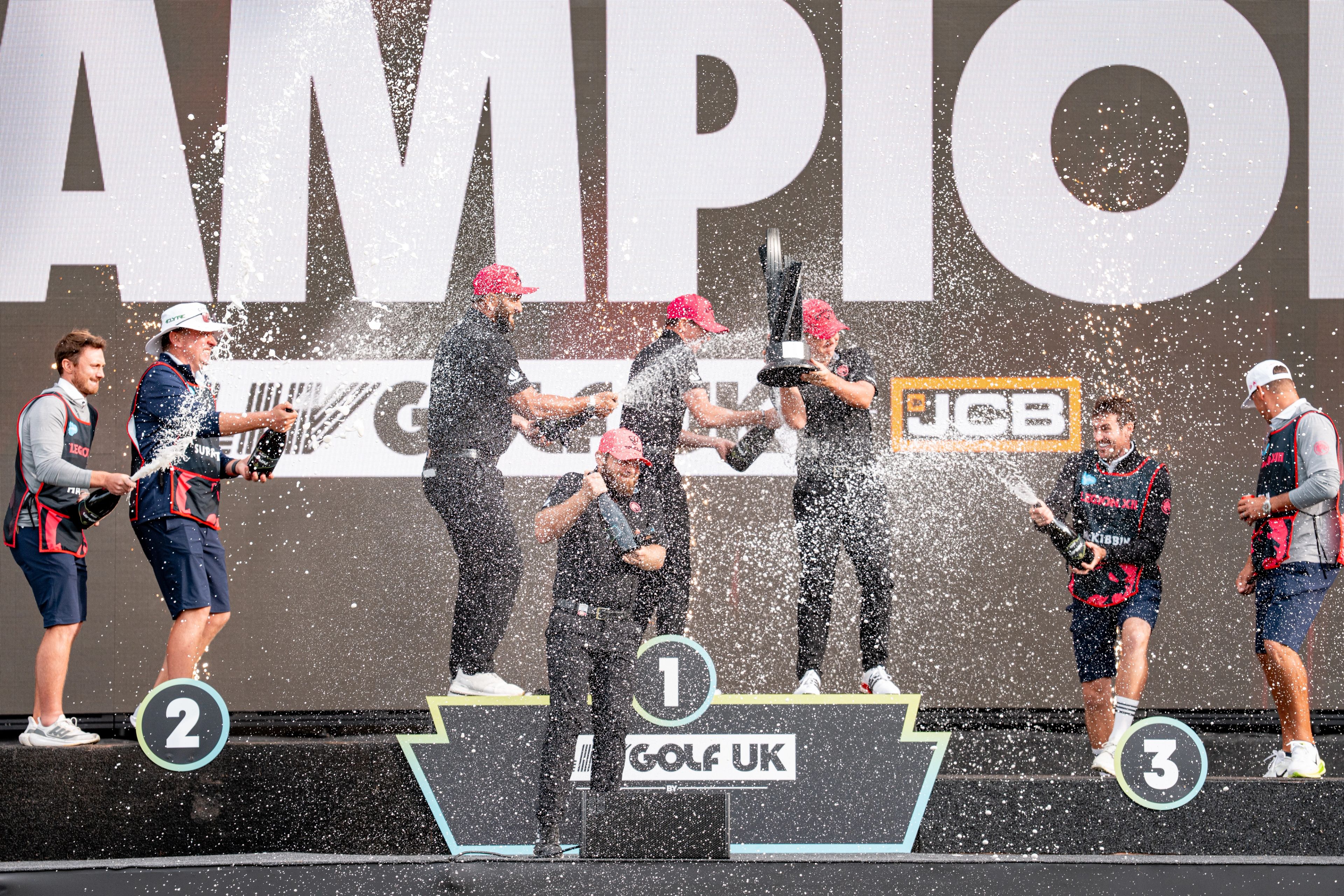 Legion XIII celebrate after winning the team title at LIV Golf United Kingdom presented by JCB in 2025.