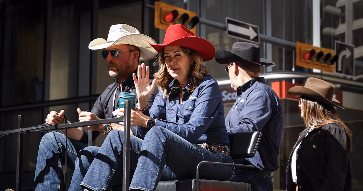 'You suuuuuck!': Smith gets cheers and jeers riding in Calgary Stampede parade - CTV News