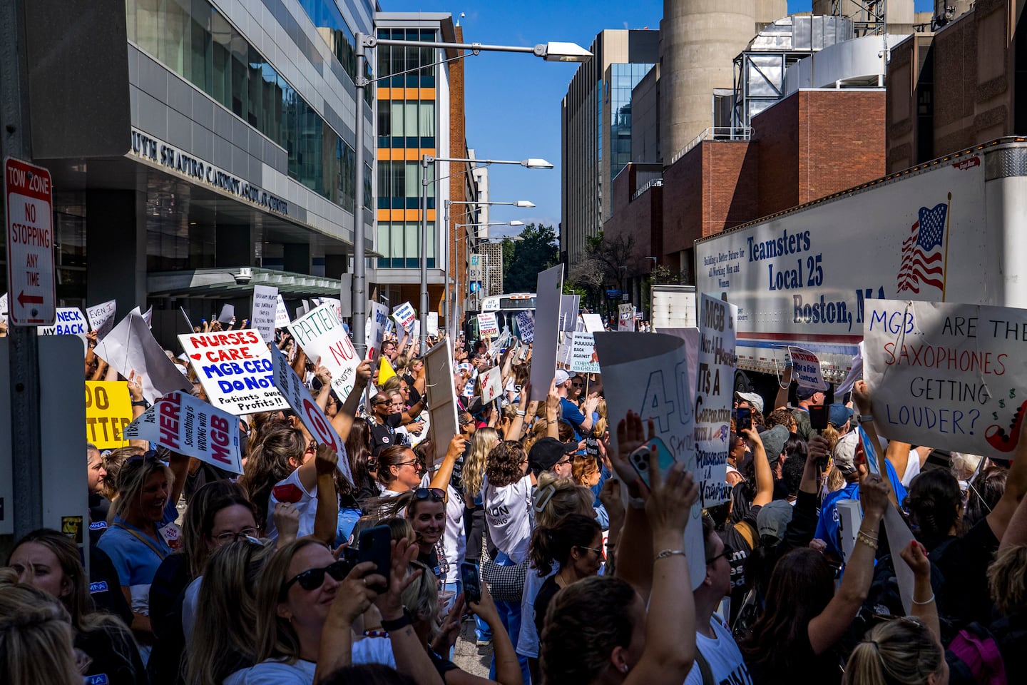 Nurses cheered as a Teamsters truck honked after the nurses strike began outside Brigham and Women's Hospital on Wednesday.