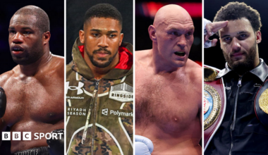 Daniel Dubois (left) holds up his black boxing gloves, Anthony Joshua (left centre) wearing a camouflage vest, Tyson Fury (right centre) wearing a white boxing glove and Moses Itauma (right) wearing a black vest holds his hand to his forehead