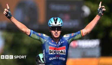 Tim Merlier celebrates winning stage eight of the 2026 Tour de France