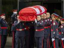 The casket holding Toronto Police Const. Marc Pinizzotto is carried at his funeral at Toronto Congress Centre on Wednesday June 24, 2026. Pinizzotto was killed in the line of duty on June 11, 2026. 