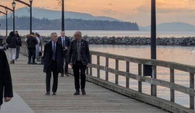 Prime Minister Mark Carney and South Surrey-White Rock MP Ernie Klassen walk the pier during the Prime Minister&rsquo;s brief visit to White Rock on Nov. 12, 2025. (Alex Browne/Peace Arch News)