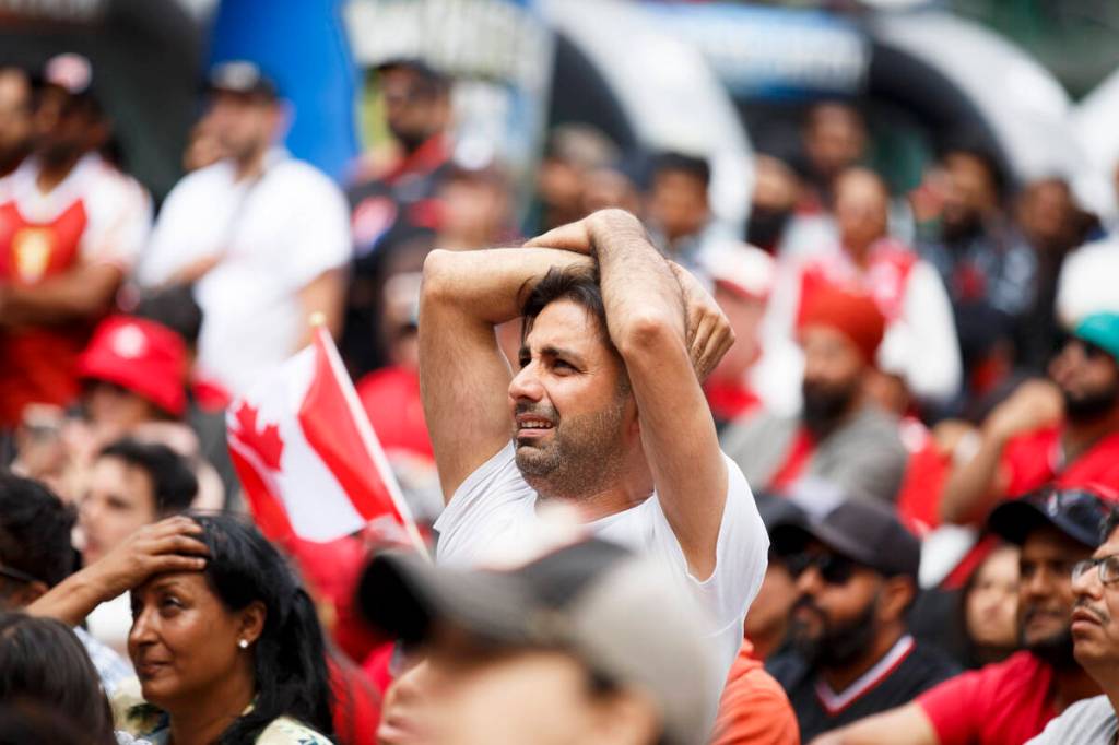 A Canadian fan watching the Canada vs. Morocco match at the Surrey soccer fan zone in Civic Plaza in Surrey on Saturday, July 4, 2026. Morocco defeated Canada 3-0. (Anna Burns/ Surrey Now-Leader)