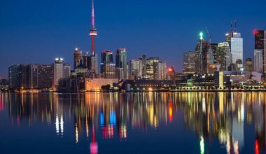 The CN Tower, at the left of this photograph, is one of the distinctive features of the Toronto skyline. (Pixabay.com)