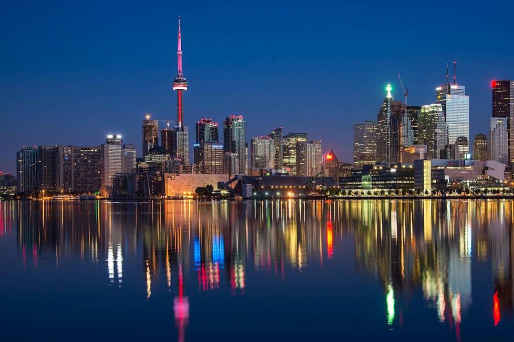 The CN Tower, at the left of this photograph, is one of the distinctive features of the Toronto skyline. (Pixabay.com)