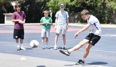 Boys take turns trying for the fastest shot on net during World Cup fun at the Pitt Meadows Recreation Centre on Wednesday, June 24. (Colleen Flanagan/The News)