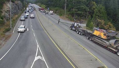 Drive BC cameras show a downed power line in the northbound lane at Shawnigan Lake Road, with cars backed up in north- and southbound lanes. (Drive BC)