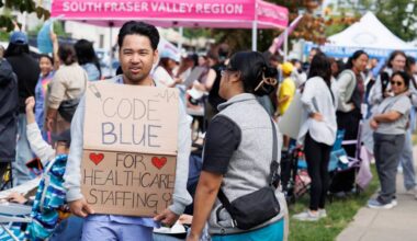 Nurses and other health-care workers walking the picket line outside of Surrey Memorial Hospital in Surrey on Thursday, July 9, 2026. (Anna Burns/ Surrey Now-Leader)