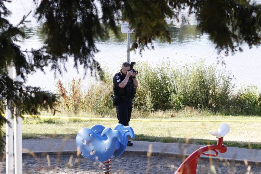 Police investigate an incident in the area of Craigflower Schoolhouse and Kosapsom Park Saturday morning, July 11. (Courtesy of Charles Bodi)