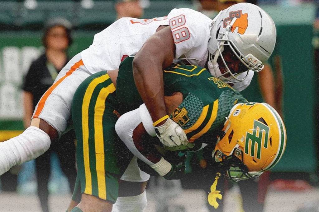 Hergy Mayala, top of the B.C. Lions tackles Javon Leake of the Edmonton Elks during CFL action Friday, July 17, 2026 at Commonwealth Stadium in Edmonton. (https://x.com/BCLions)