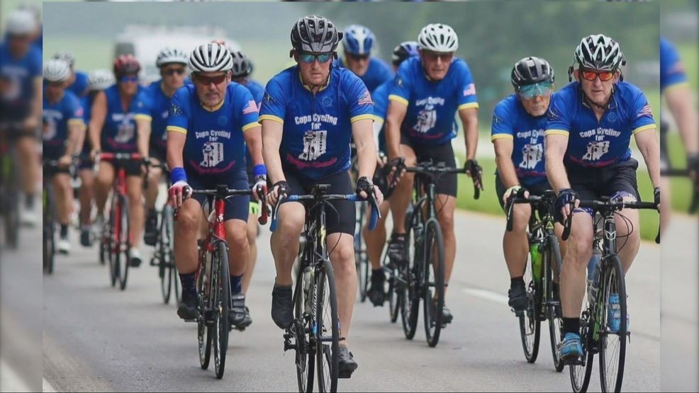 Sgt. Reeder (middle), an avid cyclist and member of the Honor Guard, said he has a personal connection to this ride (WSBT Photo).
