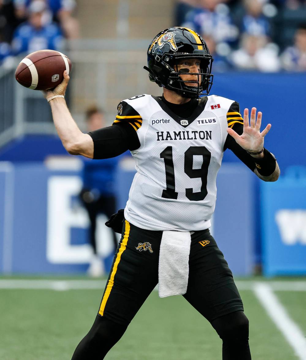 JOHN WOODS / THE CANADIAN PRESS FILES
Hamilton Tiger-Cats quarterback Bo Levi Mitchell has posted a perfect quarterback rating in each of his last two outings, and if he does it again Sunday, the pivot will join Warren Moon as the only quarterbacks in CFL history to accomplish the feat in three straight games.