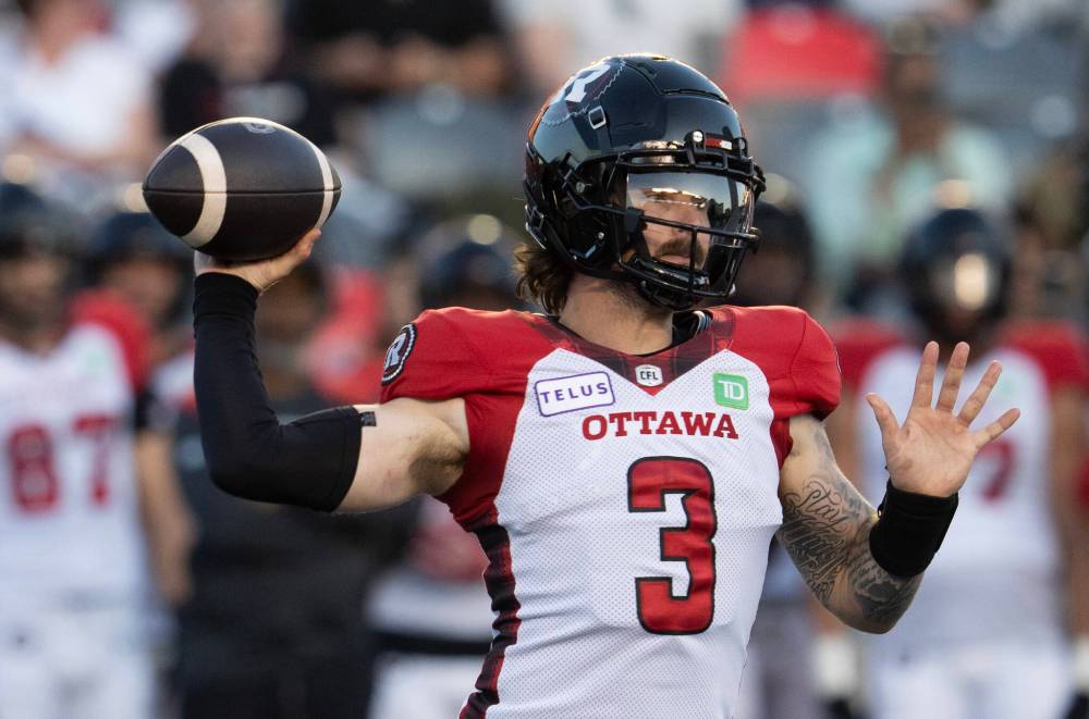 ADRIAN WYLE / THE CANADIAN PRESS
Ottawa RedBlacks quarterback Dru Brown attempts a pass against the Montreal Alouettes during first half CFL pre-season action in 2024 in Ottawa.