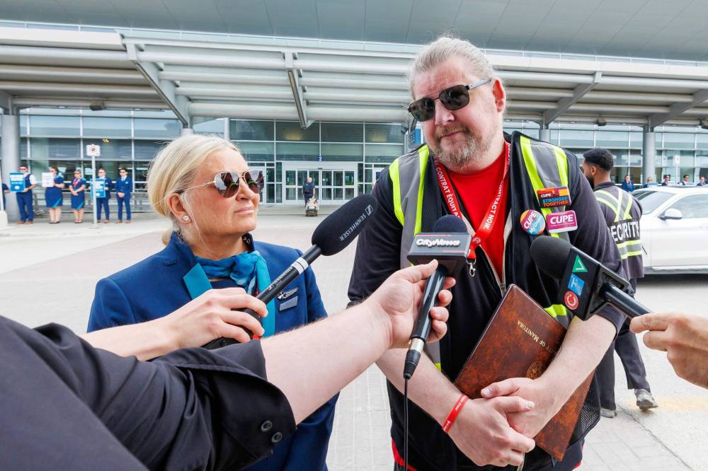 MIKE DEAL / FREE PRESS
Rena Kisfalvi, who has been a flight attendant for around 20 years, and Tyson Conrad, a flight attendant for around 18 years, speak to the media in Winnipeg on Tuesday.