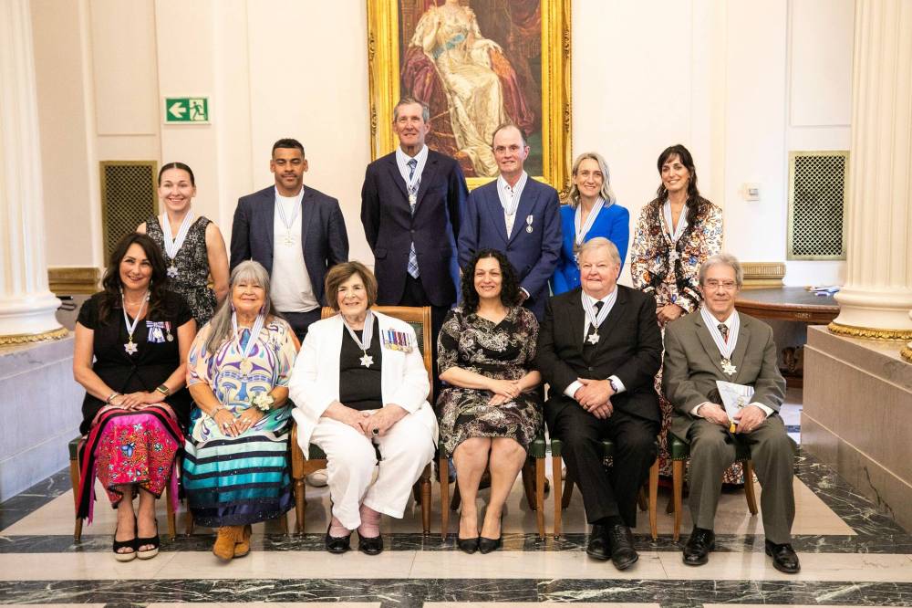 MIKAELA MACKENZIE / FREE PRESS
The newest Order of Manitoba recipients at the Manitoba Legislative Building on Thursday.