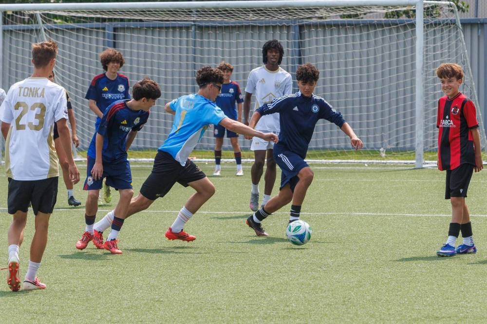 MIKE DEAL / FREE PRESS
Young people take part in a soccer scrimmage Friday after an announcement that the province will commit $750,000 into upgrades at the Ralph Cantafio Soccer Complex.