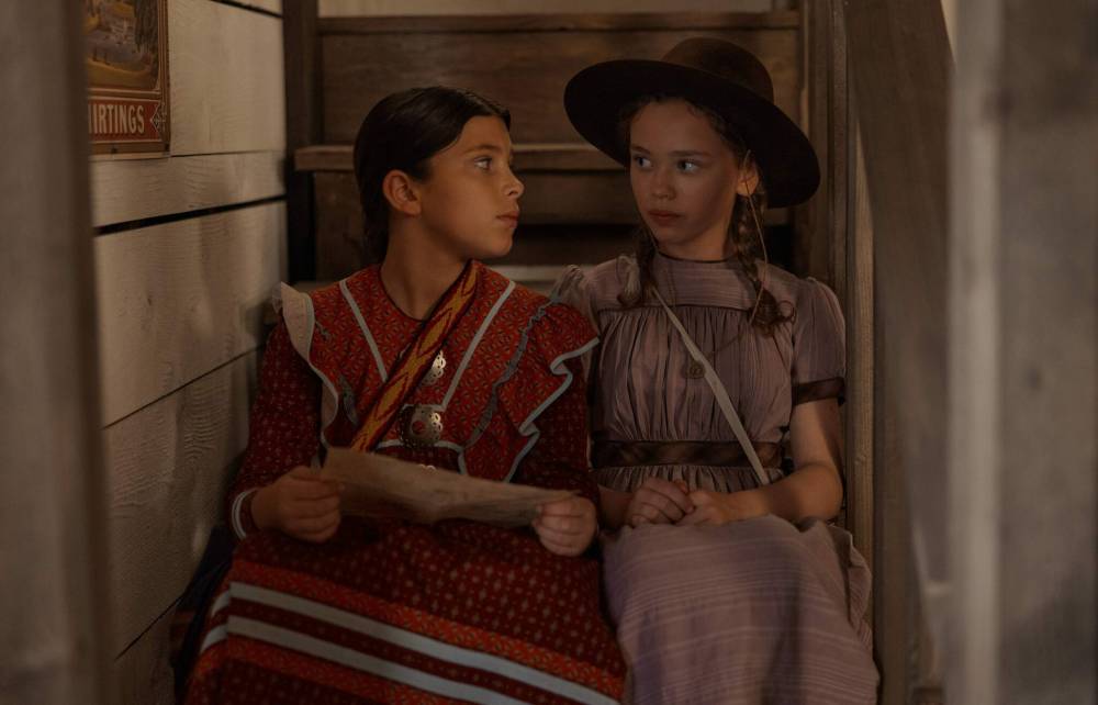 Eric Zachanowich/Netflix
Wren Zhawenim Gotts (left) as Good Eagle, Alice Halsey as Laura Ingalls in Little House on the Prairie.