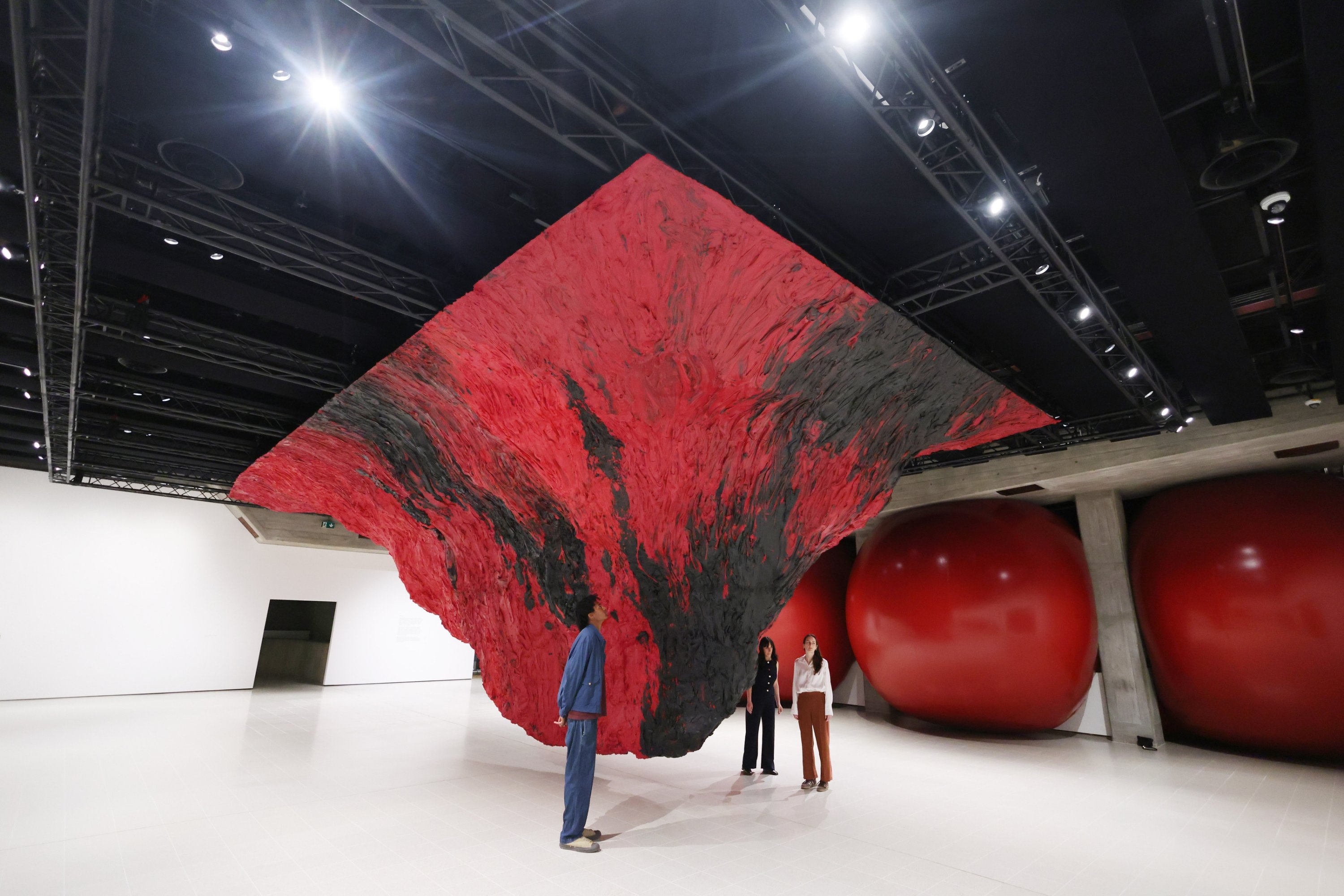 Gallery workers pose with the work “Mount Moriah at the Gate of the Ghetto” at the Anish Kapoor exhibition at the Hayward Gallery, London, U.K., June 15, 2026. (EPA Photo)