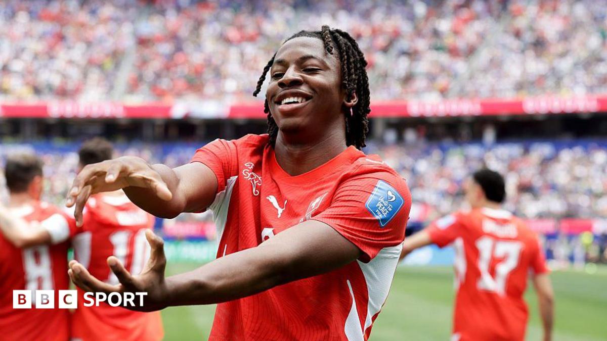 Johan Manzambi celebrates after scoring for Switzerland at the World Cup