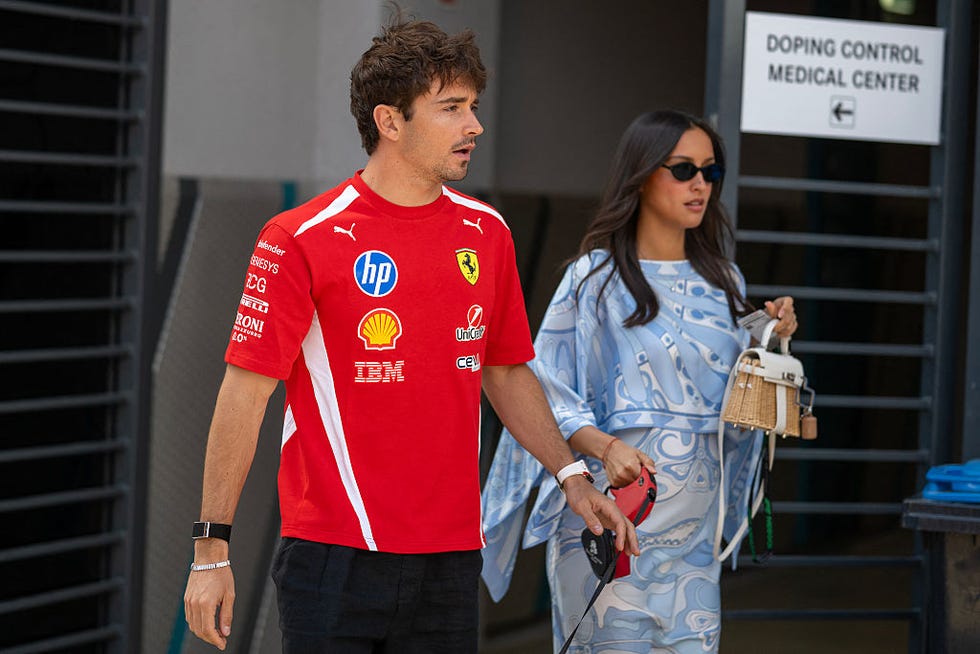 AUTO-PRIX-F1-HUN-PRACTICE ferraris monegasque driver charles leclerc and his wife alexandra leclerc walk in the paddock prior the first practice session at the hungaroring racetrack in mogyorod near budapest, hungary, on july 24, 2026 ahead of the formula one hungarian grand prix photo by andrej isakovic afp via getty images