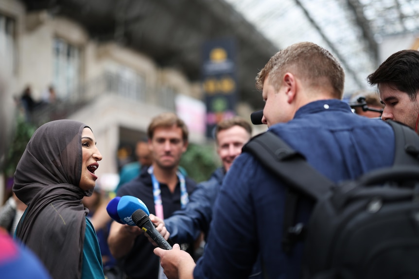 Australian Boxer Tina Rahimi speaks to the media.