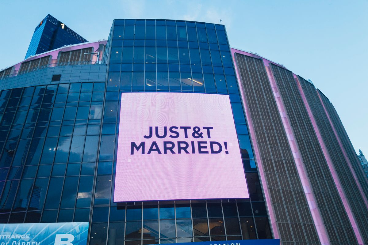  The screens displayed "Just T&T Married!" outside Madison Square Garden in New York, New York on July 3, 2026