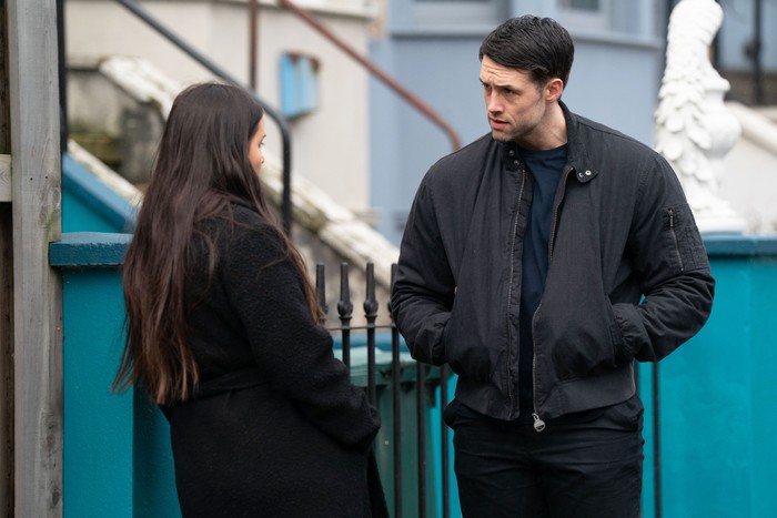 557115,TITLE:Eastenders Lauren chats to Mark in a scene from EastEnders