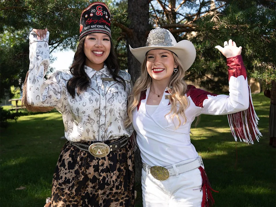 First Nations Princess Raegan First Rider (left) and Stampede Princess Sarah O’Brien pose for a photo at the Legacy Stampede Breakfast at Heritage Park in Calgary on Sunday, July 5, 2026.