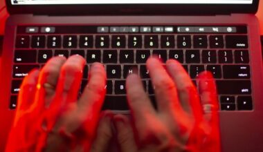 A man uses a computer keyboard in Toronto in this Sunday, Oct. 9, 2023 photo illustration. THE CANADIAN PRESS/Graeme Roy