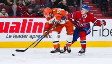 Montreal Canadiens defenseman Kaiden Guhle (21) defends against Anaheim Ducks defenseman Jacob Trouba (65) during the third period at Bell Centre.