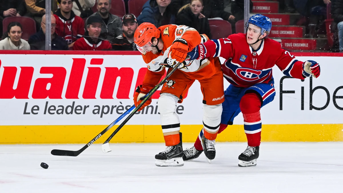 Montreal Canadiens defenseman Kaiden Guhle (21) defends against Anaheim Ducks defenseman Jacob Trouba (65) during the third period at Bell Centre.