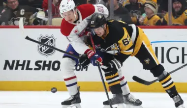 Montr&eacute;al Canadiens center Oliver Kapanen (91) and Pittsburgh Penguins right wing Rickard Rakell (67) chase a loose puck during the second period at PPG Paints Arena.