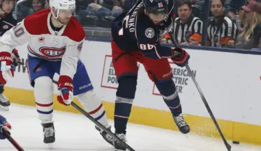 Montreal Canadiens right wing Joel Armia (40) and Columbus Blue Jackets right wing Kirill Marchenko (86) battle for a loose puck during the first period at Nationwide Arena.