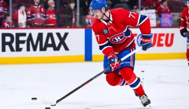 Montreal Canadiens center Kirby Dach (77) skates with a puck during warm-up before the game against the New York Islanders at Bell Centre.
