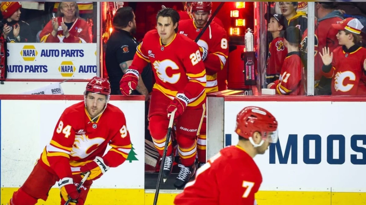 Calgary Flames defenseman Zach Whitecloud (28) takes the ice during the warmup period against the New Jersey Devils at Scotiabank Saddledome.