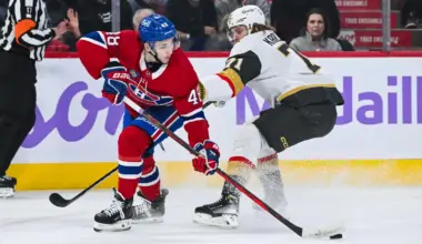 Montreal Canadiens defenseman Lane Hutson (48) defends the puck against Las Vegas Golden Knights center William Karlsson (71) during the first period at Bell Centre.
