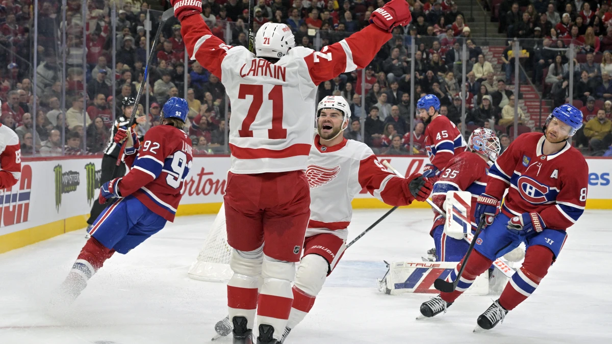 Detroit Red Wings forward Dylan Larkin (71) celebrates after scoring a goal against Montreal Canadiens goalie Sam Montembeault (35) during the first period at the Bell Centre.