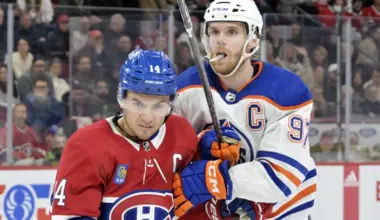 Montreal Canadiens forward Nick Suzuki (14) and Edmonton Oilers forward Connor McDavid (97) during the third period at the Bell Centre.